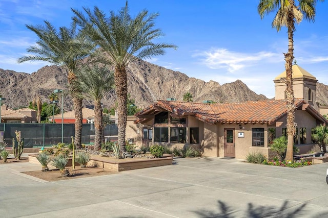 view of front of home with a mountain view