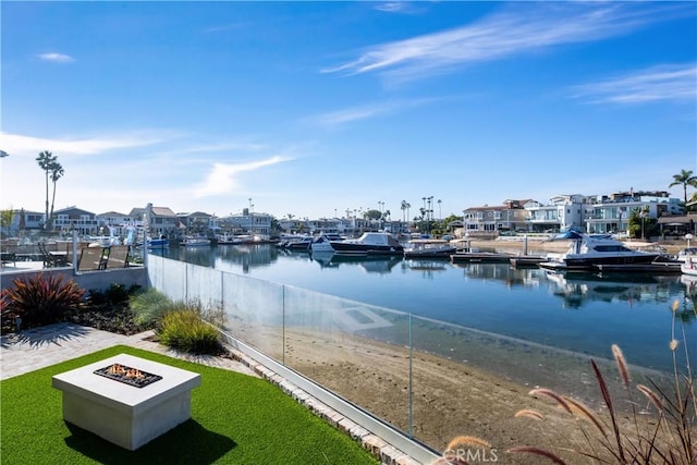 water view with a fire pit