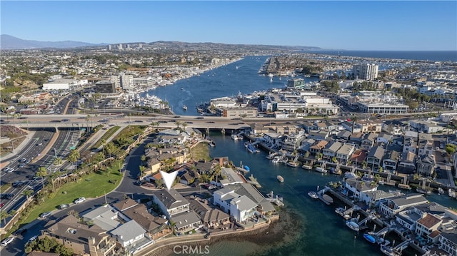 bird's eye view featuring a water and mountain view