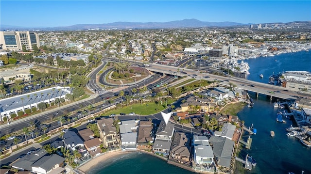 bird's eye view featuring a water and mountain view