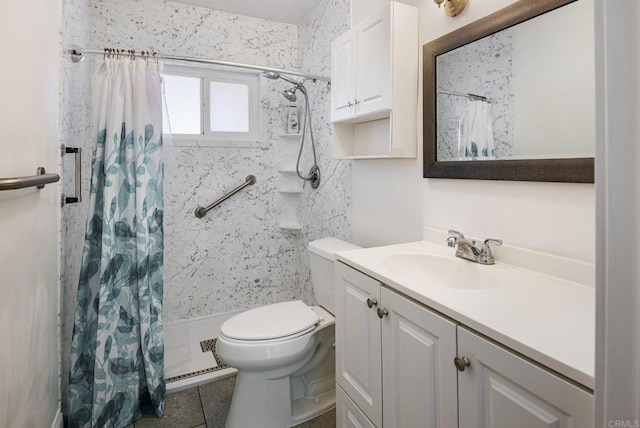 full bathroom featuring tile patterned flooring, vanity, shower / bath combo with shower curtain, and toilet