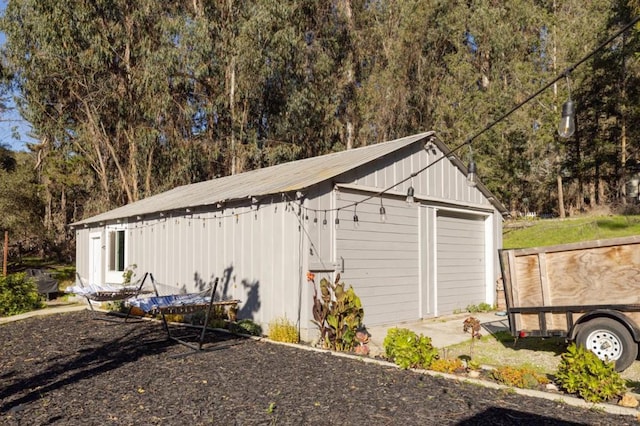 view of outbuilding with a garage