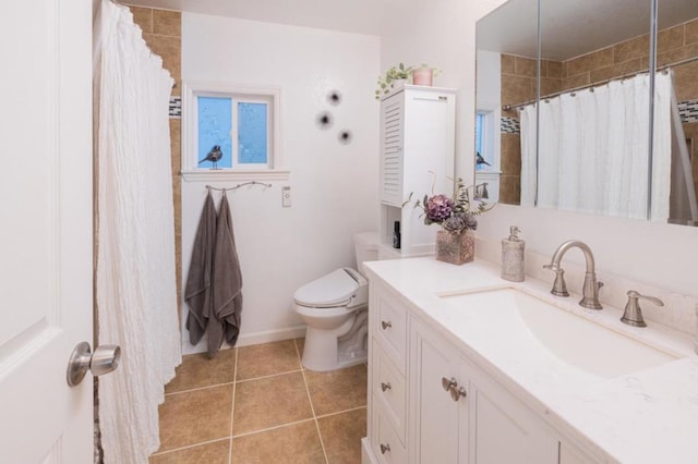 bathroom with vanity, tile patterned flooring, a shower with curtain, and toilet