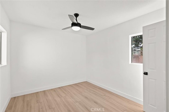 unfurnished room featuring ceiling fan and light hardwood / wood-style flooring