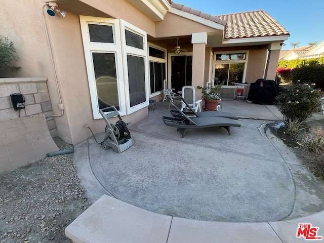 view of patio / terrace featuring a grill