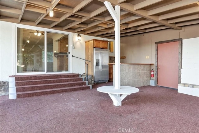 doorway to property featuring a patio area