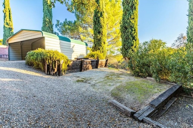 view of yard featuring a carport