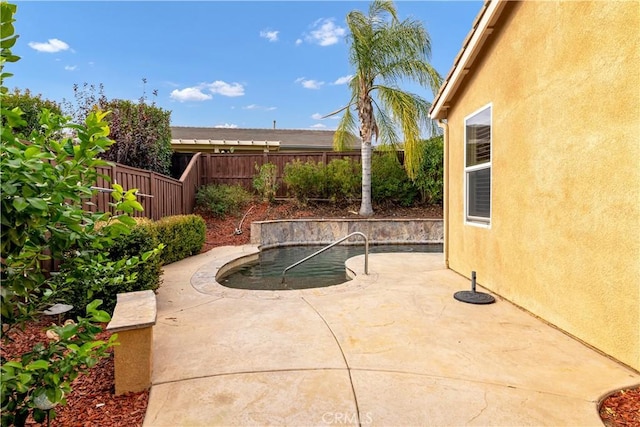 view of patio featuring a fenced backyard