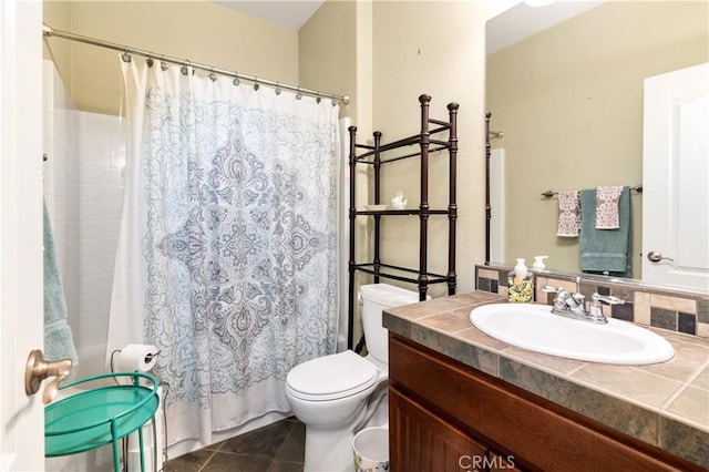 full bathroom featuring shower / bath combo, vanity, toilet, and tile patterned floors