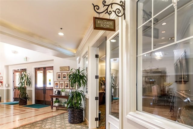 interior space with recessed lighting, french doors, and crown molding