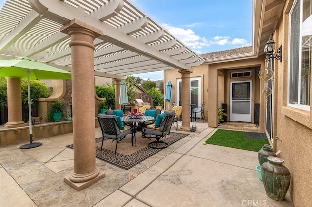 view of patio / terrace featuring a pergola