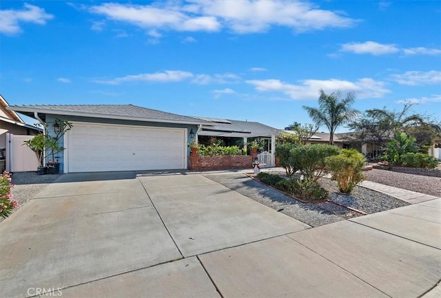 single story home with a garage