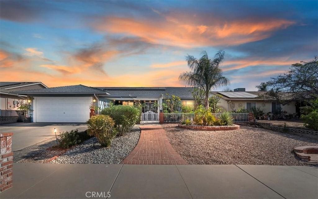 view of front of home featuring a garage