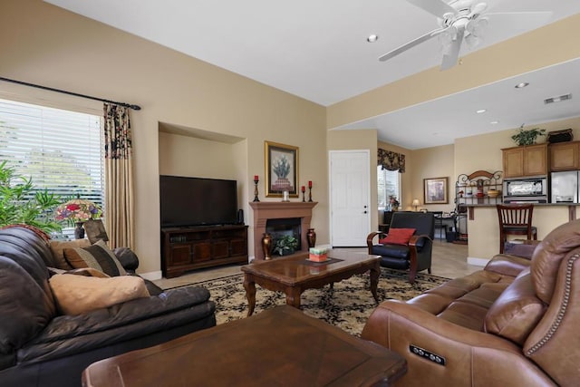 living room with ceiling fan