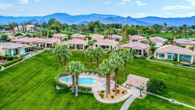 drone / aerial view featuring a mountain view