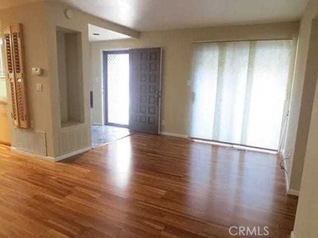 entrance foyer with hardwood / wood-style flooring