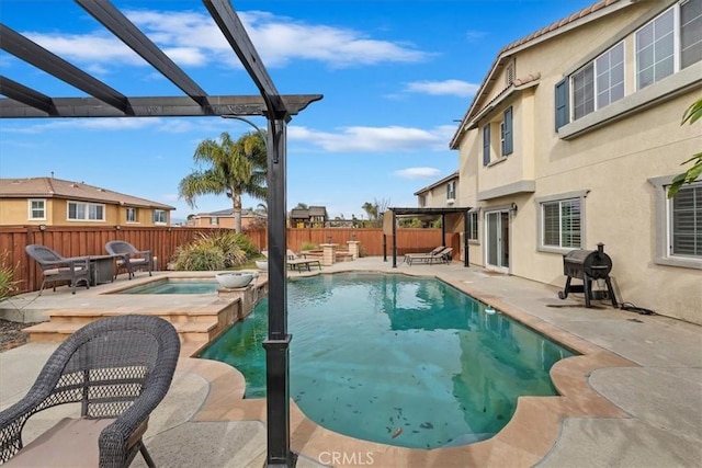 view of swimming pool featuring an in ground hot tub, a pergola, area for grilling, and a patio area