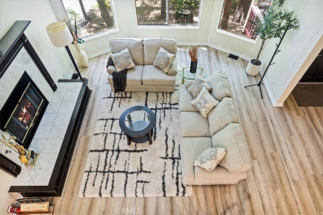 28670 Shenandoah Dr, Lake Arrowhead, CA 92352 - living room with wood finished floors and a fireplace