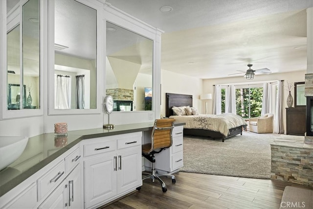 28670 Shenandoah Dr, Lake Arrowhead, CA 92352 - bedroom with dark wood finished floors and an office area