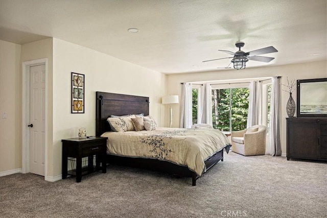28670 Shenandoah Dr, Lake Arrowhead, CA 92352 - carpeted bedroom with baseboards and a ceiling fan