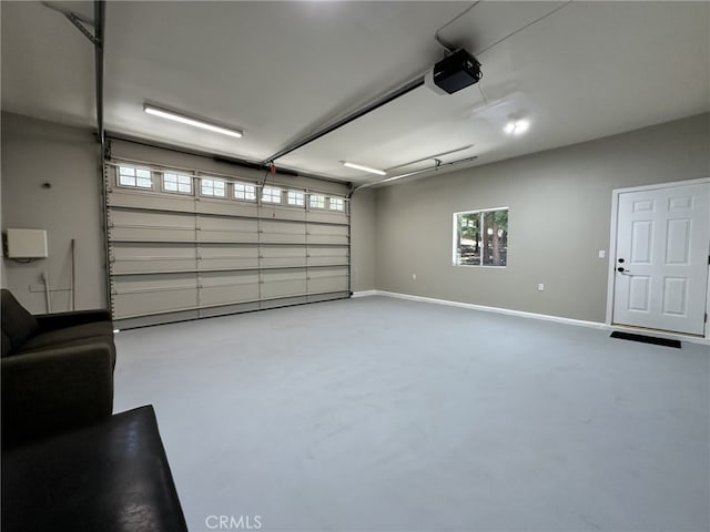 28670 Shenandoah Dr, Lake Arrowhead, CA 92352 - garage with a garage door opener and baseboards