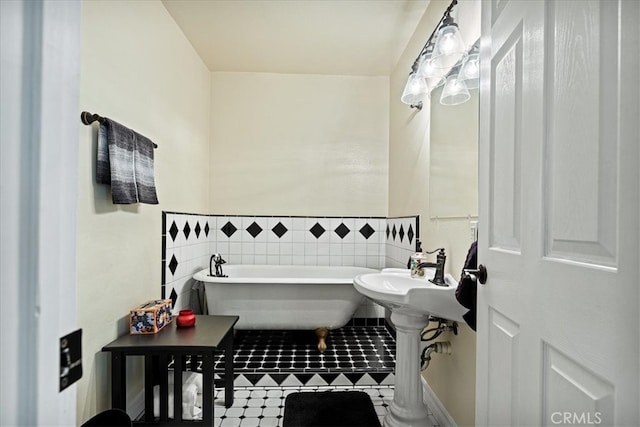 28670 Shenandoah Dr, Lake Arrowhead, CA 92352 - full bath with a soaking tub, wainscoting, tile patterned floors, and tile walls