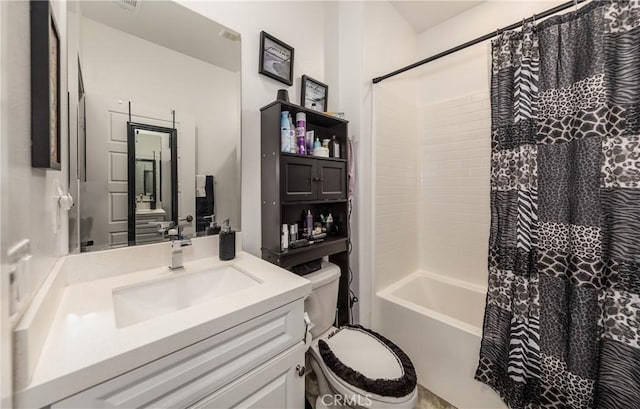 full bathroom with vanity, shower / bath combination with curtain, and toilet