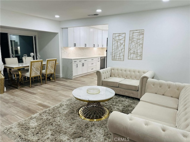 living room with light wood-type flooring