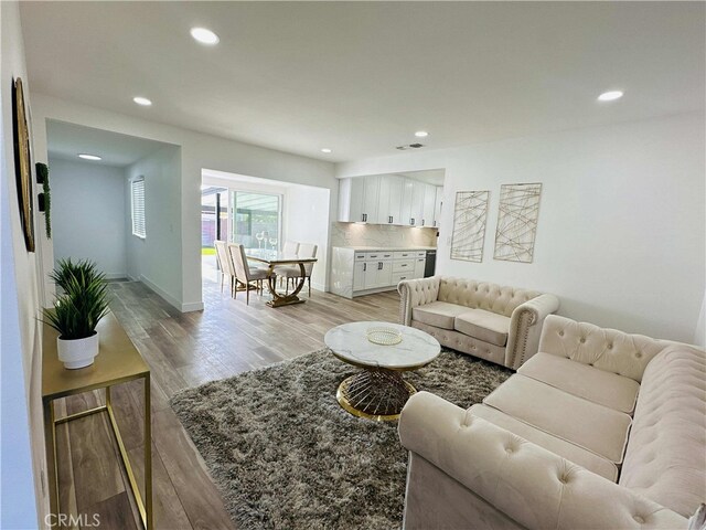 living room with light hardwood / wood-style floors