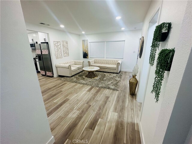 living room featuring light hardwood / wood-style flooring