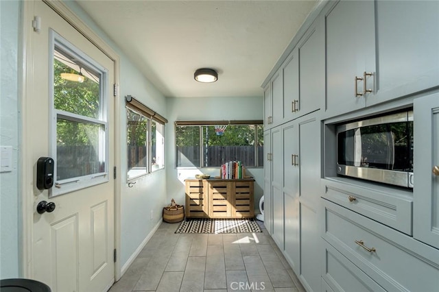 mudroom with light tile patterned floors