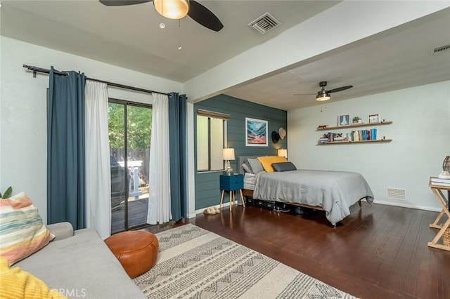 bedroom featuring access to outside, ceiling fan, and hardwood / wood-style flooring