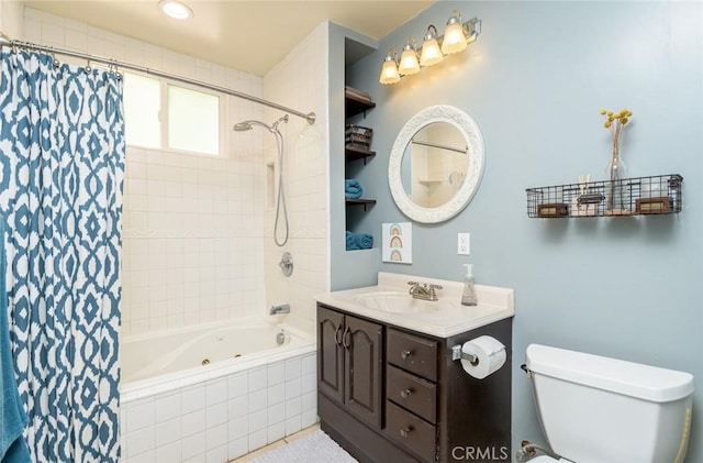 full bathroom with vanity, toilet, and shower / tub combo