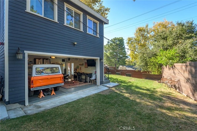 rear view of house featuring a yard