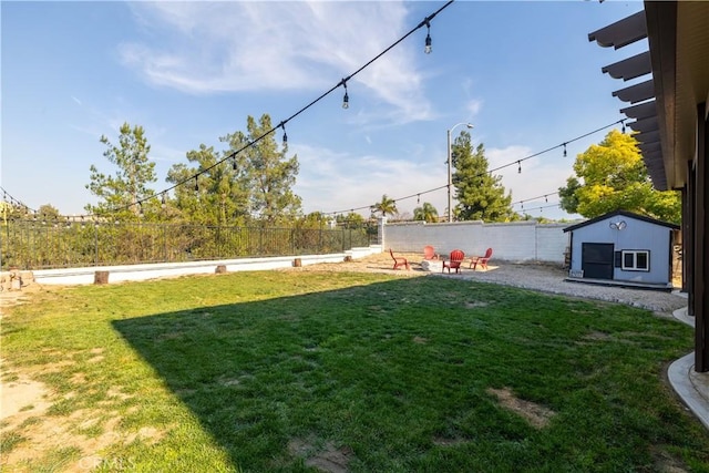 view of yard featuring a storage unit