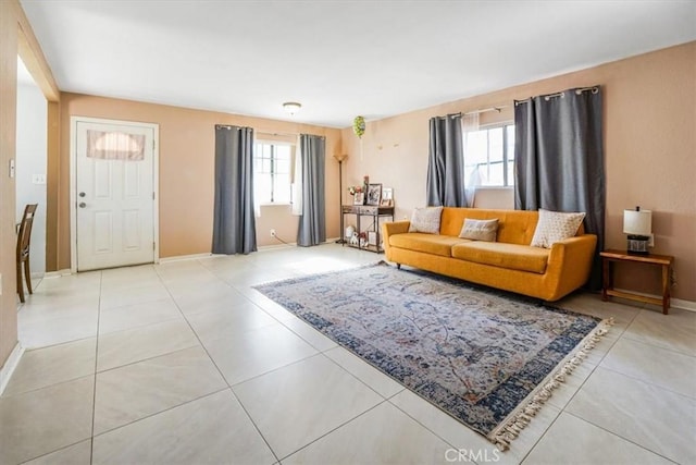 living room with light tile patterned floors