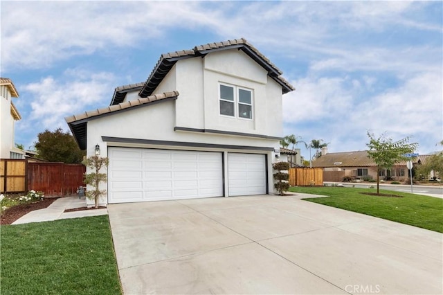 exterior space with a front lawn and a garage