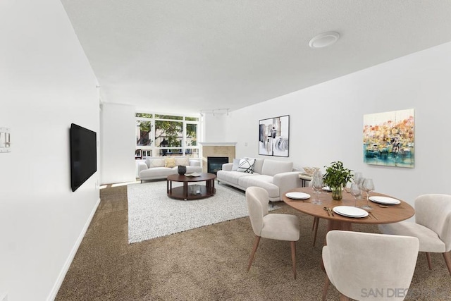 dining space with dark carpet