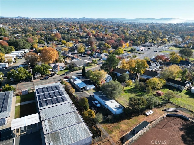 birds eye view of property featuring a mountain view