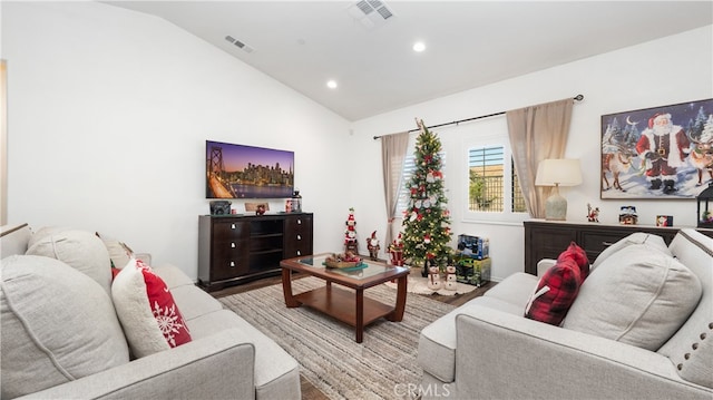 living room with lofted ceiling