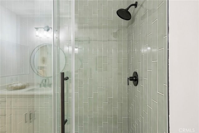 bathroom with an enclosed shower