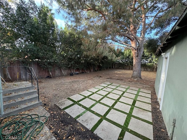 1355 N Gordon St, Pomona, CA 91768 - fenced backyard featuring a patio area