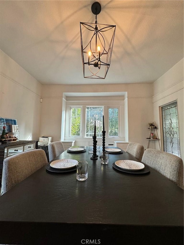 1355 N Gordon St, Pomona, CA 91768 - dining space featuring a chandelier