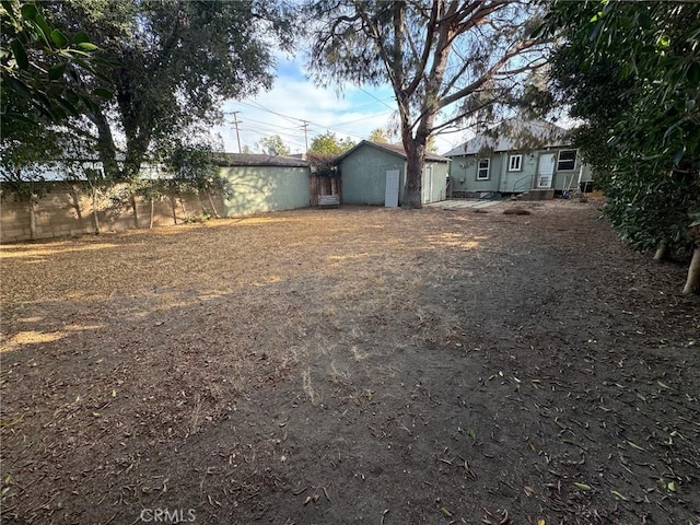 view of yard featuring fence