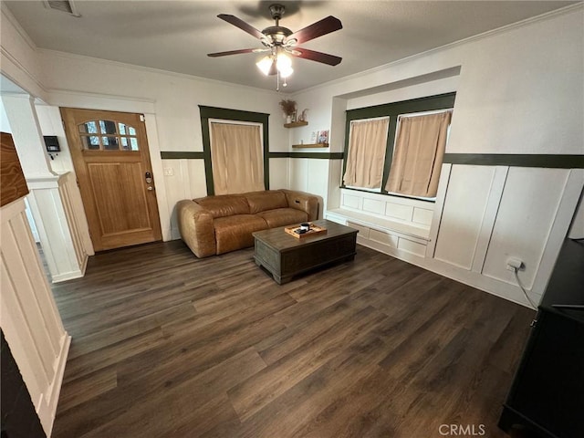 1355 N Gordon St, Pomona, CA 91768 - living room with a decorative wall, ceiling fan, crown molding, dark wood finished floors, and a wainscoted wall