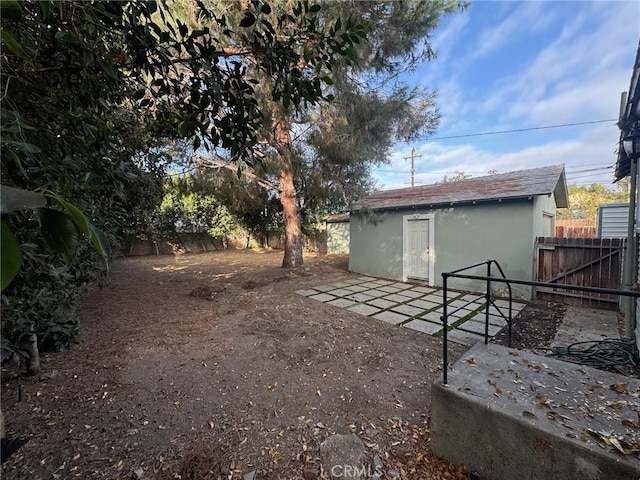 view of yard with a patio area and fence