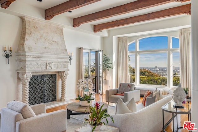 living room featuring a premium fireplace and light hardwood / wood-style flooring