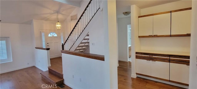 hallway with light hardwood / wood-style floors