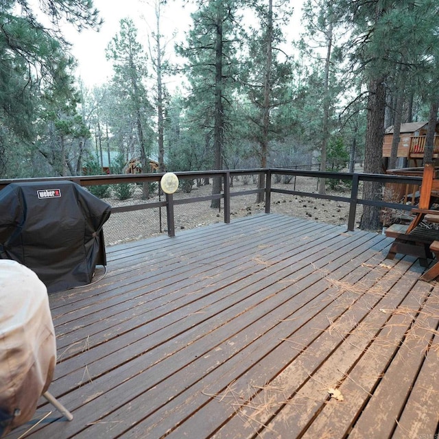 wooden terrace with grilling area