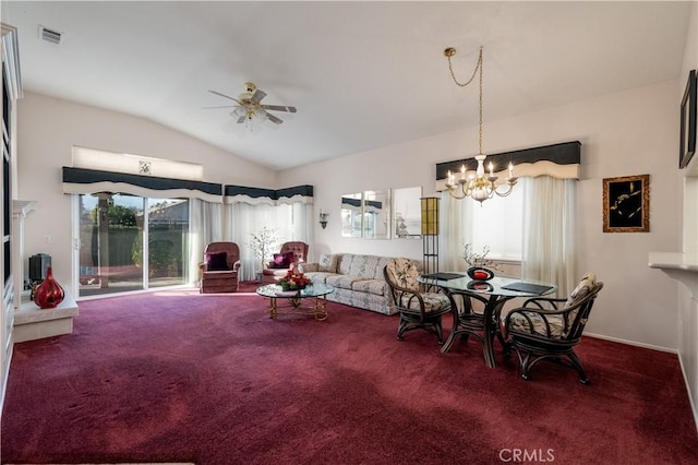 dining room with carpet, a wealth of natural light, ceiling fan with notable chandelier, and lofted ceiling